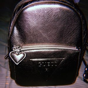 GUESS Metallic Backpack Purse